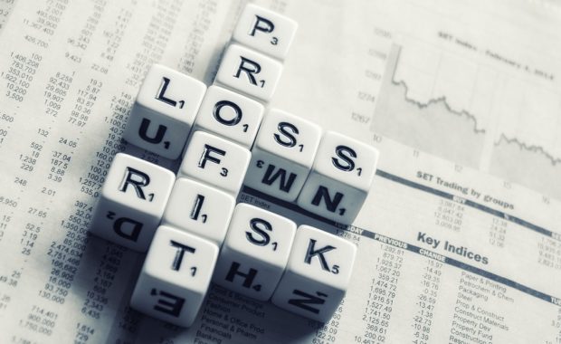 Alphabet Cubes With Words Profit, Loss, And Risk Put On By Apprise Wealth Management