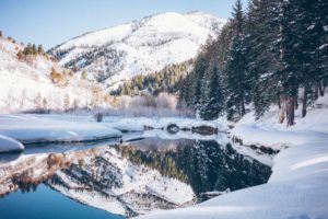 Mountain and Lake Covered In Snow Put On By Apprise Wealth Management